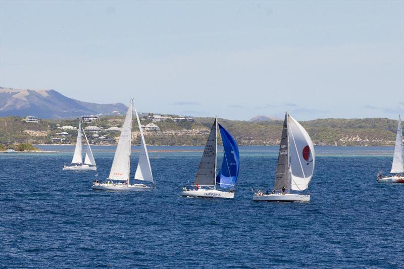 Crews from around the world enjoyed sailing to a different anchorage every night as they circumnavigated Antigua photo copyright Tim Wright / Photoaction.com taken at Antigua Yacht Club