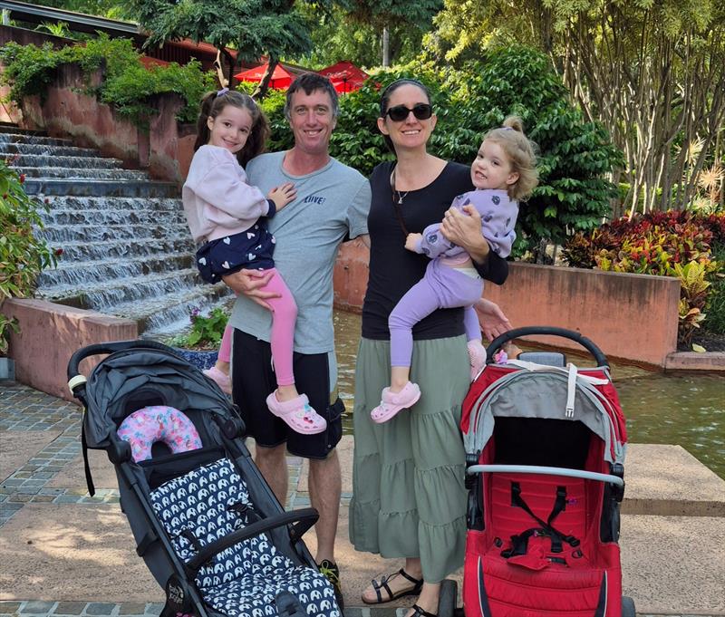 Lucy Scarrott (left) with her parents Andy and Cat and sister Ella, pictured in happier times - photo © Whitsunday Escape
