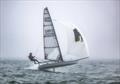 Graeme Oliver – Sailing through fog at the 2024 Musto Skiff Open © Michael Oliver