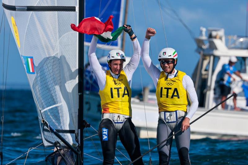 Caterina Banti with Ruggero Tita (ITA) celebrate gold photo copyright Sailing Energy / World Sailing taken at  and featuring the Nacra 17 class