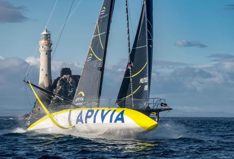 Apivia after rounding the Fastnet Rock in the Rolex Fastnet Race photo copyright Kurt Arrigo / Rolex taken at Royal Ocean Racing Club and featuring the IMOCA class