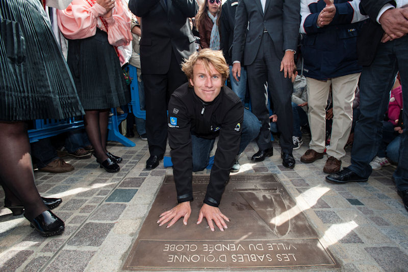 François Gabart. the sixth winner in the history of the Vendée Globe leaves his handprints on his 'Walk of Fame' plate photo copyright Olivier Blanchet / DPPI / Vendée Globe taken at  and featuring the IMOCA class