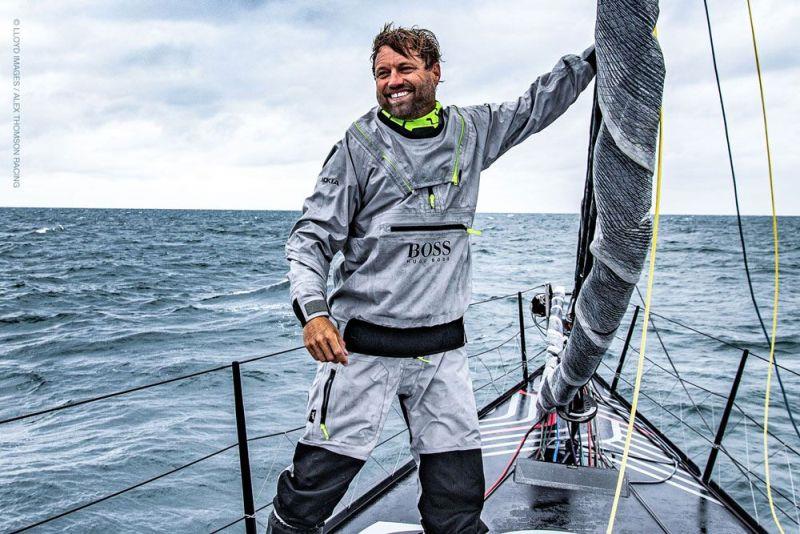 Alex Thomson on bow photo copyright Lloyd Images / Alex Thomson Racing taken at  and featuring the IMOCA class