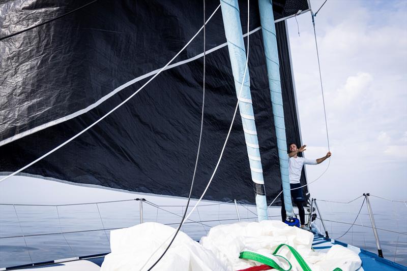The Ocean Race 2022-23 - 17 June, 2023 Leg 7 Day 2 onboard Biotherm; Alan Roberts at the bow guiding the sail through the gybe photo copyright Anne Beauge / Biotherm / The Ocean Race taken at  and featuring the IMOCA class