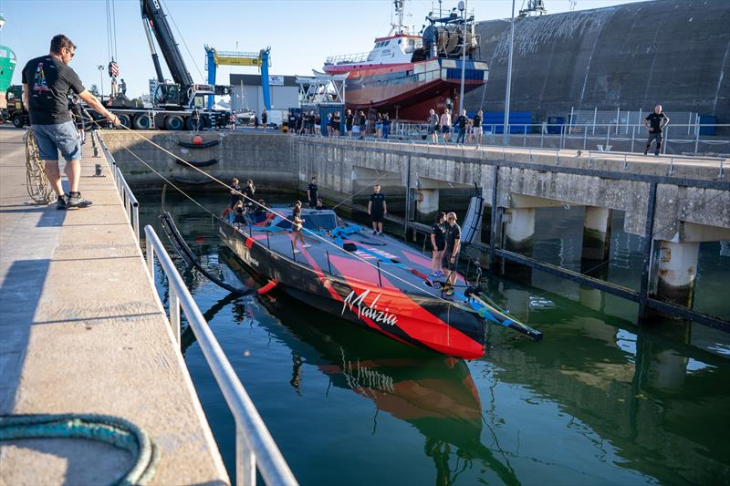 Malizia 4 and the team, shortly after her very first splash early this morning - photo © Marie Lefloch / Team Malizia