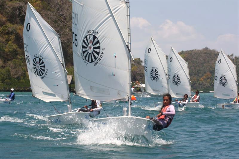 Royal Cargo All Souls Regatta photo copyright Peter Stevens taken at Puerto Galera Yacht Club and featuring the Optimist class
