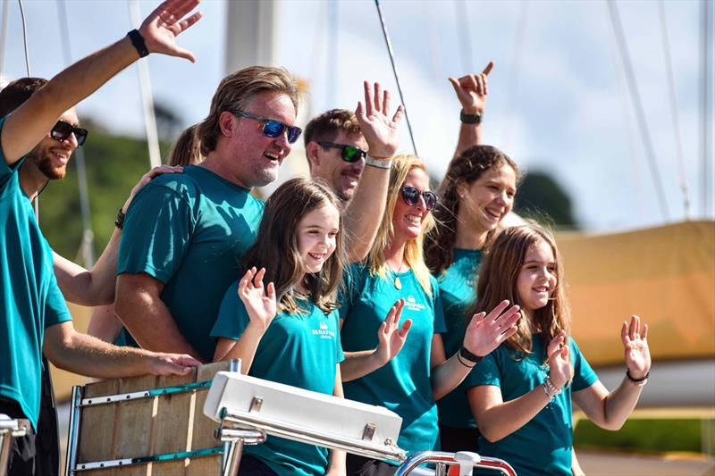 The crew of the Oyster 885, Serafina, waving goodbye to well-wishers just before the leaving the dock at Nelson's Boatyard, Antigua - photo © James Tomlinson