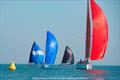 Class winner Southern Cross (red spinnaker) at Edgartown Race Weekend's 2025 'Round-the-Island Race © Miste Photography