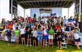 Sailors celebrate after the 116th Chicago Yacht Club Race to Mackinac presented by Wintrust © Anna Suslova Media