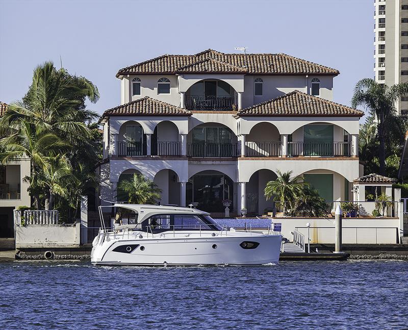 Fitting right in to her surroundings - the Bavaria E34 - photo © John Curnow