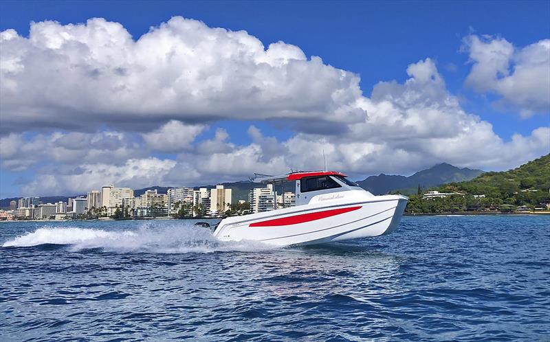 Aquila Molokai Cat 28 - bow out - only way to run photo copyright Aquila Boats taken at  and featuring the Power boat class