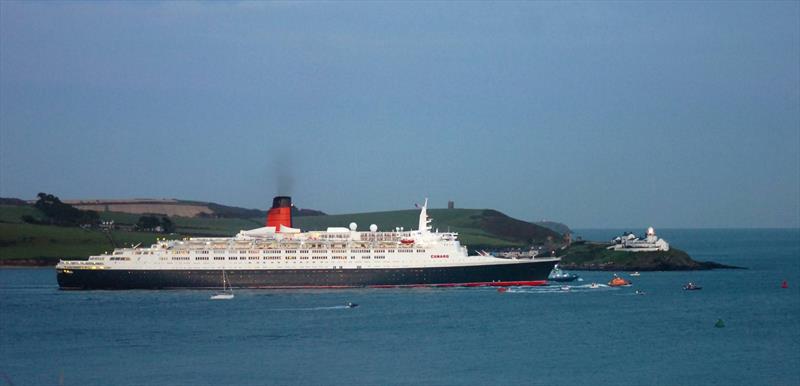 The Cunard liner QE2 sailing past Roche's point, following her last ever visit to Cobh - photo © Richard Mills / Irish Examiner Archive