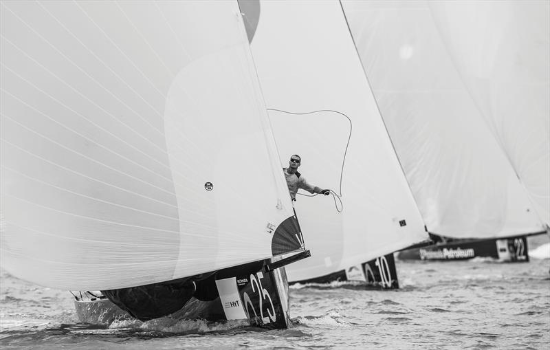 Sean 'Doogie' Couvreux on the bow of Team Aqua on day 2 of the RC44 Bermuda Cup - photo © NicoMartinez / MartinezStudio