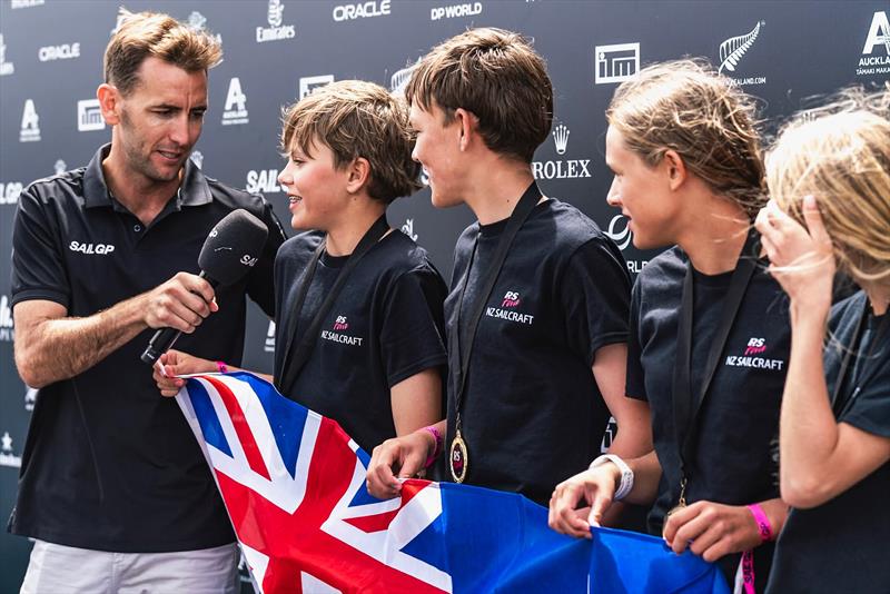 Matteo Barker and Blake Battten with first girls Zofia Wells and Charlotte Handley, on the SailGP main stage prizegiving - January 2025 photo copyright SailGP taken at Royal Akarana Yacht Club and featuring the RS Feva class