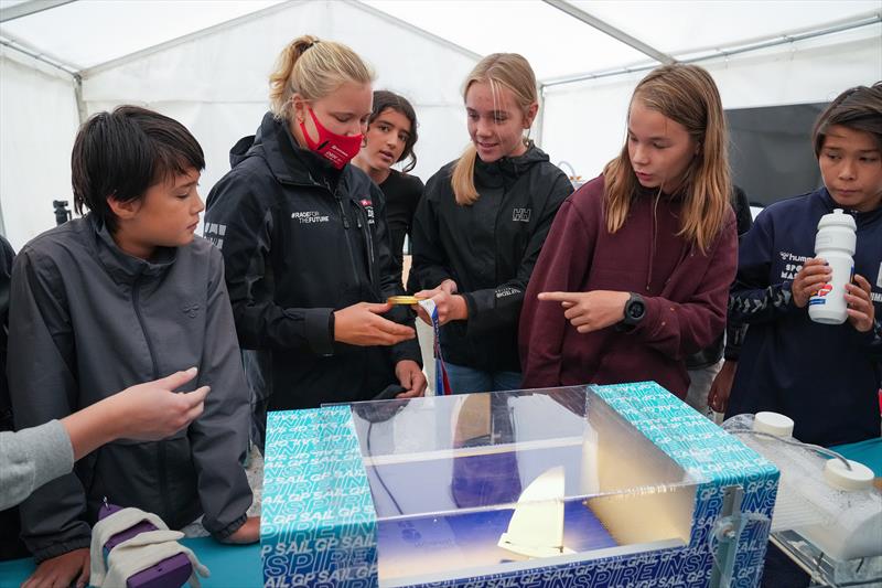 Danish school pupils hold the gold Olympic medal of Anne-Marie Rindom from Denmark SailGP Team  photo copyright Thomas Lovelock/SailGP taken at Takapuna Boating Club and featuring the  class