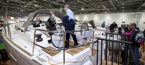 Visitors looking at the Sun Odyssey yachts on the Jeanneau stand at the London Boat Show 2014, ExCeL, London. photo copyright onEdition http://www.onEdition.com taken at  and featuring the  class