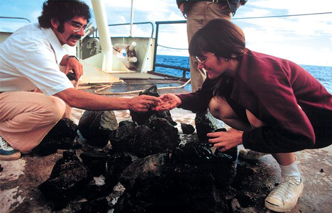 Knorr took scientists to get their first surprising views of the seafloor on the mid-ocean ridge in the historic French-American Mid-Ocean Undersea Study (Project FAMOUS) in 1973. The research cruise was historic in another way: Eight women aboard represented the first significant female participation at sea in a large oceanographic program. Over the years, Knorr also broke barriers to welcome women aboard WHOI ships as crew members.  © WHOI Archives