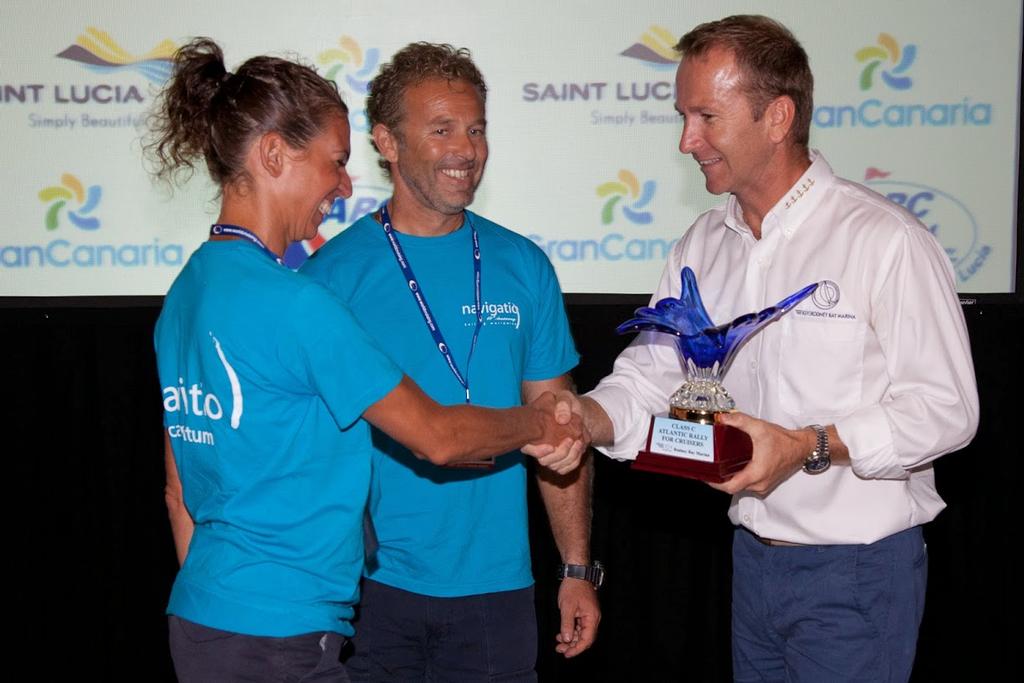 IGY Rodney Bay Marina Manager Simon Bryan presents Hiera with 1st place trophy for 1st in Cruising Class  - ARC 2014. photo copyright WCC / Clare Pengelly taken at  and featuring the  class