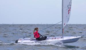 Going for a surf is Norway's Line Flem Host, who was third on the day. - 2014 ISAF Sailing World Cup, Melbourne photo copyright  John Curnow taken at  and featuring the  class