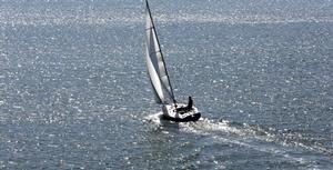 Webb Chiles aboard his Moore 24 ``GANNET,`` sailing out of San Diego's Quivira Basin in February of 2014.   
 
Photograph by:  
Steve Earley 
steve.earley@verizon.net 
757 406-3617 
 
313 Downing Drive 
Chesapake, VA  23322 
 photo copyright  SW taken at  and featuring the  class
