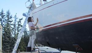 Polishing the topsides, and we all have to face it - Jeanne Socrates, oldest ever non-stop female solo circumnavigator, at work on Nereida - photo © SW