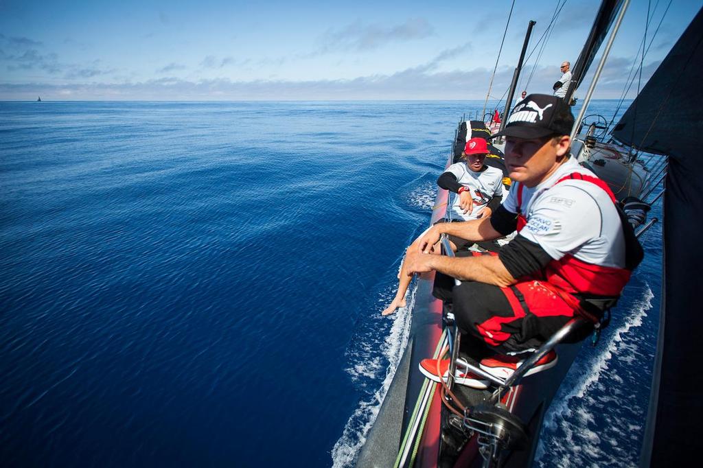 Casey Smith and Rome Kirby hang out on the bow while sailing through the 