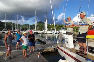 2014 Caribbean 1500 - Great welcome on the dock for Lone Star photo copyright World Cruising Club http://www.worldcruising.com taken at  and featuring the  class