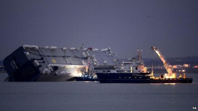 Teams are working to assess how best to refloat the cargo ship - Hoegh Osaka ran aground. ©  PA