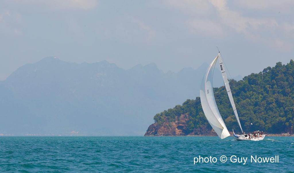 Oi! sails up to the Machincan Range. Royal Langkawi International Regatta 2015 © Guy Nowell http://www.guynowell.com