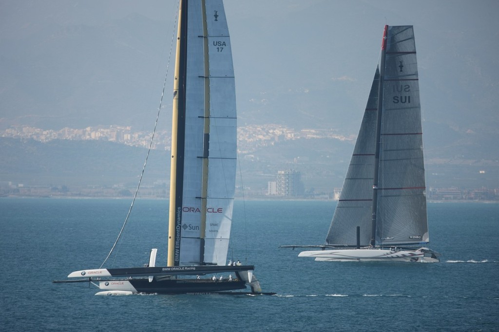 BMW Oracle USA-17 powers thru Alinghi - America’s Cup 2010 Race 1 © BMW Oracle Racing Photo Gilles Martin-Raget http://www.bmworacleracing.com