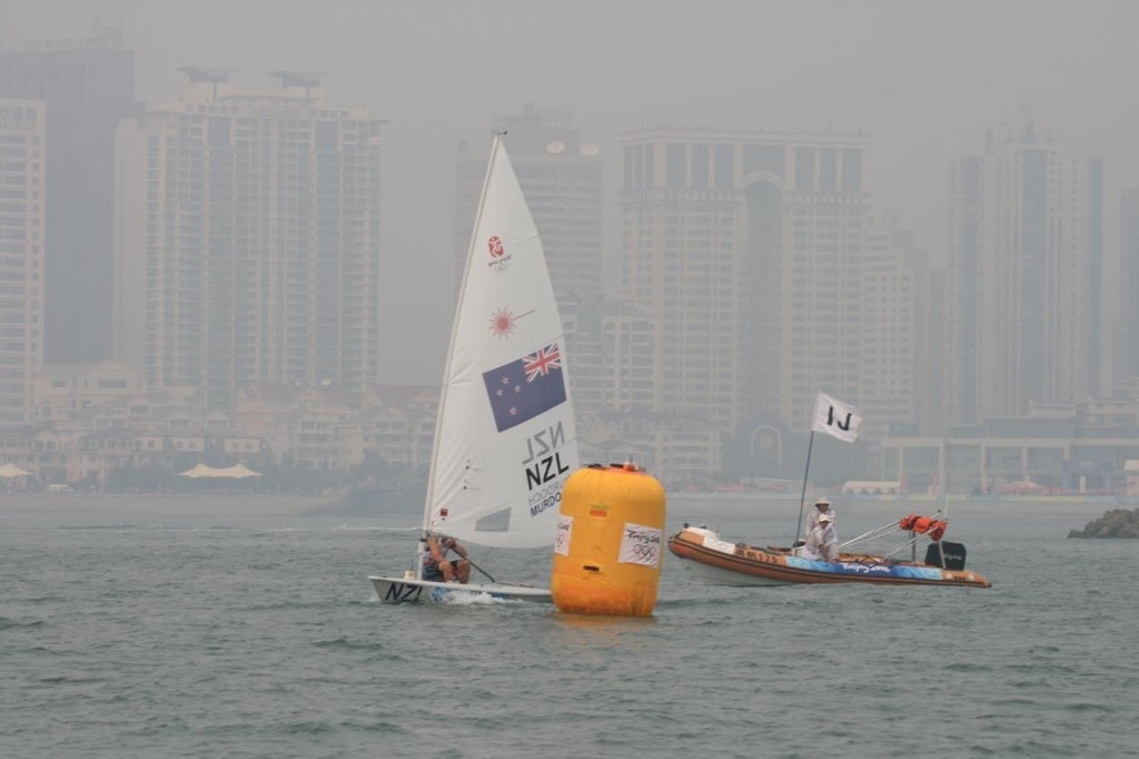Andrew Murdoch (NZL) is first around the wndward mark - 2008 Olympics Qingdao - Medal Race - Laser © Richard Gladwell www.photosport.co.nz