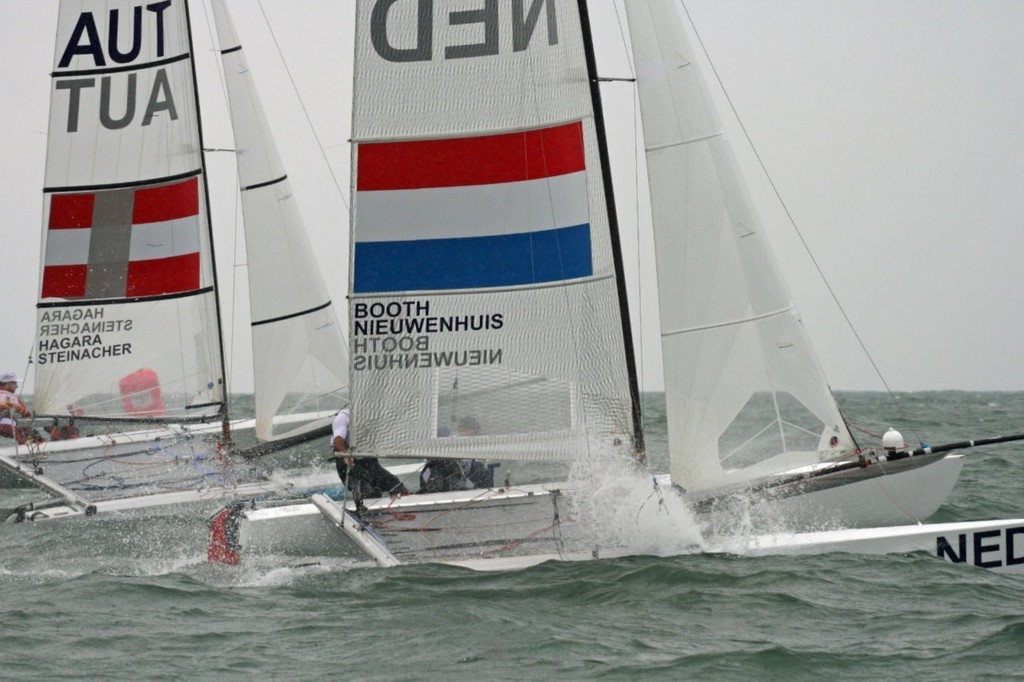 Roman Hagara and Hans-Peter Steinacher (AUT) over Mitch Booth and Pim Nieuwenhuis-  2008 Olympic Regatta - Medal Race - Tornado © Richard Gladwell www.photosport.co.nz