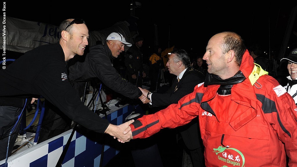Tom Addis on Telefonica 4 is greeted by Green Dragon skipper Ian Walker © Rick Tomlinson/Volvo Ocean Race http://www.volvooceanrace.com