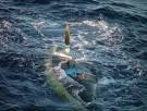 Moquini capsized photo copyright SW taken at  and featuring the  class