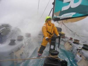 Crewman grinding as waves wash over the decks on Volvo Open 70 ABN AMRO ONE Leg 4 photo copyright Volvo Ocean Race http://www.volvooceanrace.com taken at  and featuring the  class
