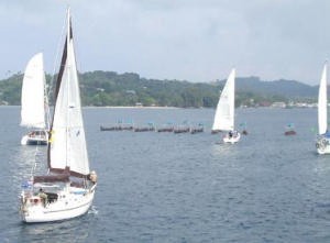 War Canoes escort arriving yachts ©  SW