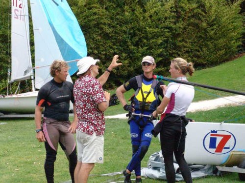 Double Olympic medalist, Rex Sellers, explains a point on Tornado sailing to Sebbe Godefroide (L) and Carolijn Brouwer (R) who won the 2006 Nationals in the Tornado at Takapuna. © Richard Gladwell www.photosport.co.nz