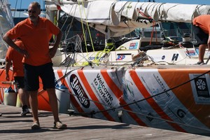 Hull &  Humber crew member, Michael Rouse, and the damage to the hull after a collision with Cork at the start of race 4 of the Clipper Race 09-10 from Cape Town, South Africa to Geraldton, Western Australia. photo copyright Clipper Ventures PLC . http://www.clipperroundtheworld.com taken at  and featuring the  class
