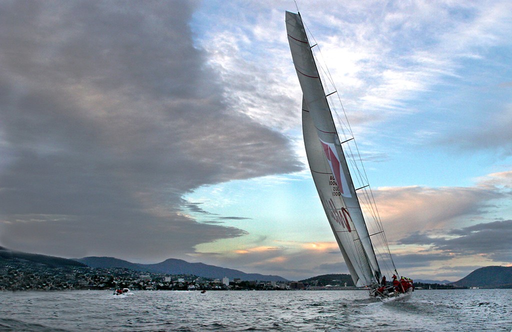 Wild Oats XI powers up the Derwent River at twilight - Rolex Sydney Hobart Yacht Race 2010 © Crosbie Lorimer http://www.crosbielorimer.com