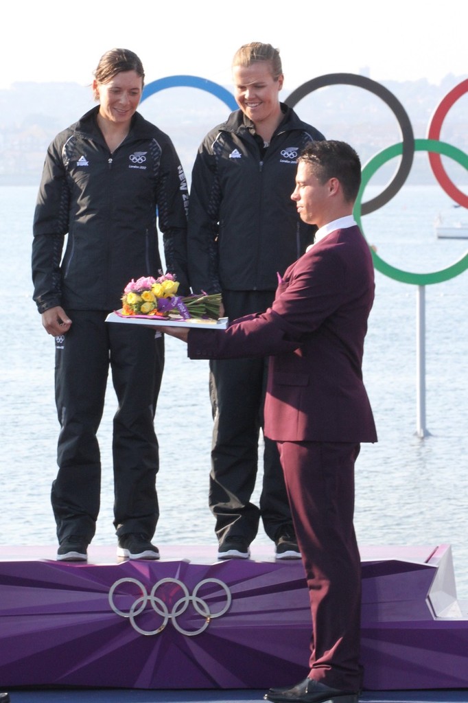  August 10, 2012 - Weymouth, England - Jo Aleh and Olivia Powrie see their Olympic Gold Medal before presentation © Richard Gladwell www.photosport.co.nz