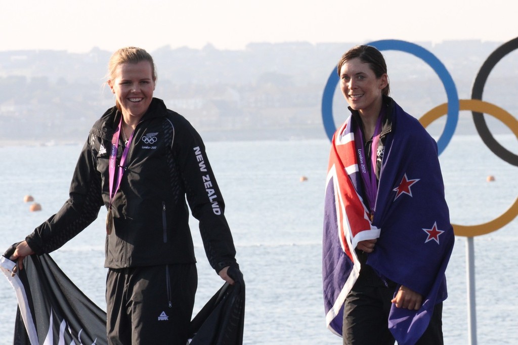 Jo Aleh and Olivia Powrie Afetr the Gold Medal ceremony in the Olympic Womens 470 © Richard Gladwell www.photosport.co.nz