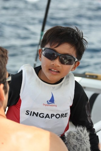 SIN119 diminutive Samuel Neo day 3 regatta leader discusses his plan for the day - Day 4 2012 Optimist Worlds &copy; John Adair