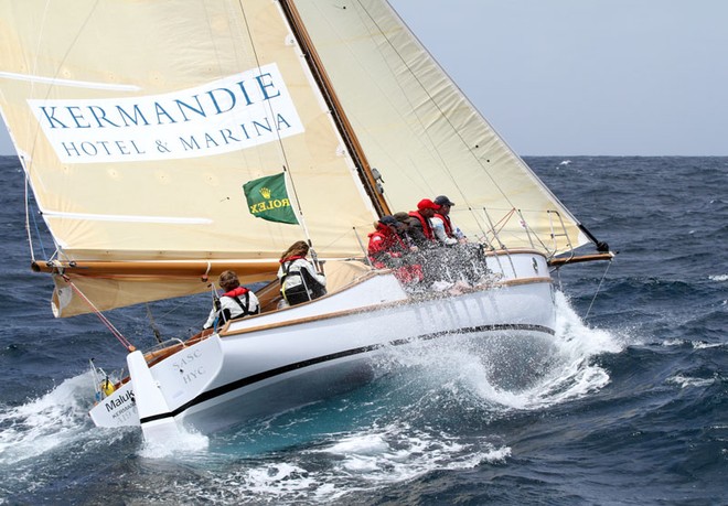 Maluka of Kermandie the smallest boat of the fleet plays with the waves - Rolex Sydney to Hobart ©  Alex McKinnon Photography http://www.alexmckinnonphotography.com