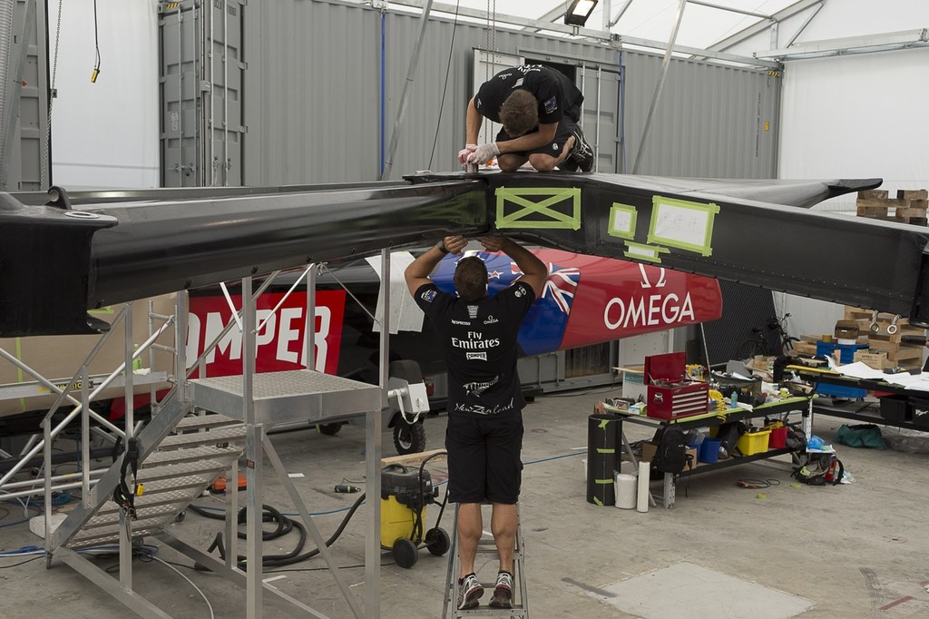 Emirates Team New Zealand sailors, boat builders and shore crew assemble the parts of the teams second AC72. 16/1/2013 © Chris Cameron/ETNZ http://www.chriscameron.co.nz