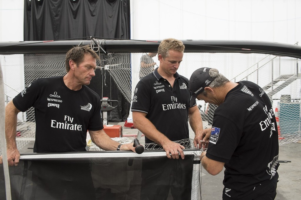 Emirates Team New Zealand, sailors Tony Rae, Winston MacFarlane and Adam Beashel work on the tramp for the teams second AC72. 23/1/2013 © Chris Cameron/ETNZ http://www.chriscameron.co.nz