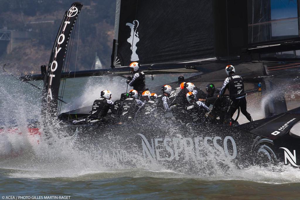 Emirates Team New Zealand vs Luna Rossa - Tom Cruise, Emirates Team New Zeland guest (black helmet with green ) at full pace on the AC72 © ACEA - Photo Gilles Martin-Raget http://photo.americascup.com/