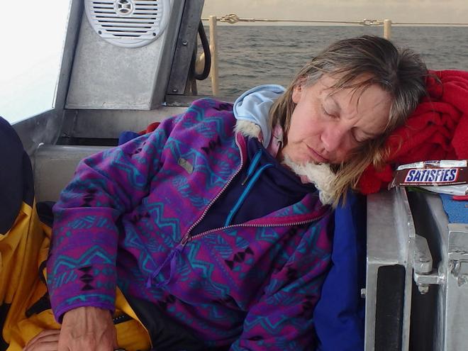 Here is a great example of non-verbal communication – while at anchor after a long passage, the message is obvious . . . “Do NOT DISTURB and I am NOT making dinner!” © Ken Gillstrom