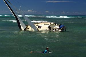 Saturday night's casualty of the huge waves at the Ala Wai photo copyright  Sharon Green / Ultimate Sailing taken at  and featuring the  class