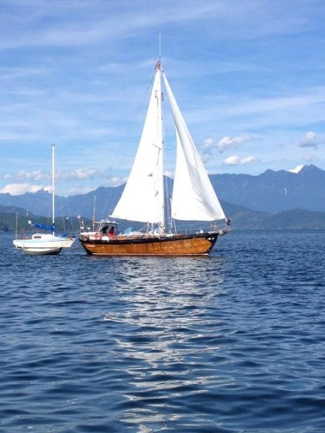 Frank and Dawn, Dulcinea II, leaving an anchorage under sail. - 2015 Peterson Cup Cruising Rally © Bluewater Cruising Association