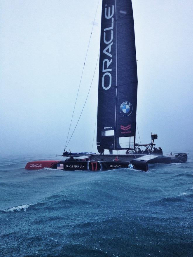 Oracle Team USA rides out a rain squall while training in Bermuda © Oracle Team USA media